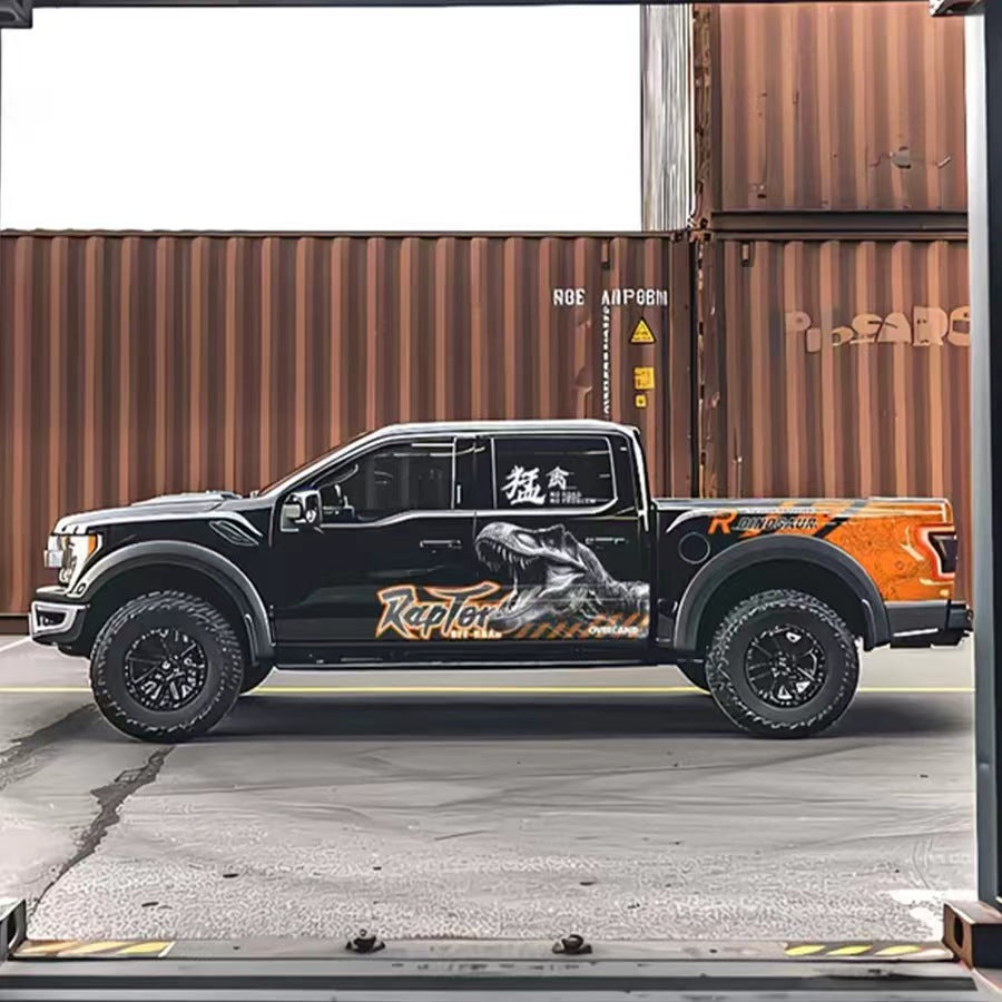 Orange Raptor Dinosaur Vinyl Wrap Applied on Truck – Off-Road Graphic Decal Side View