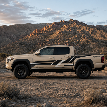 TRD geometric vinyl decal on white Toyota Tacoma truck side panel