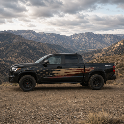 Toyota Tundra with American Flag full truck wrap side view in desert mountain terrain