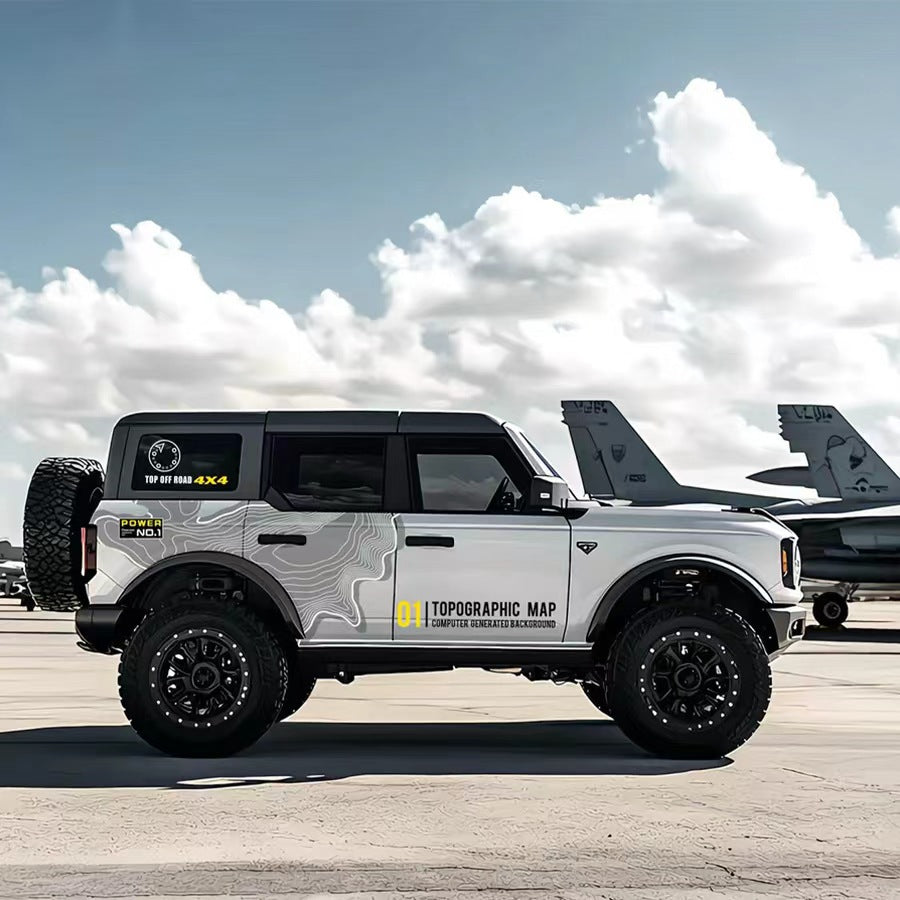 Minimal Topographic SUV Decal – Clean Contour Line Off-Road Side Vinyl Wrap on White Ford Bronco at Airport