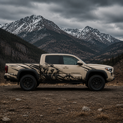 Full side view of Toyota Tacoma featuring mountain bear scene truck decal