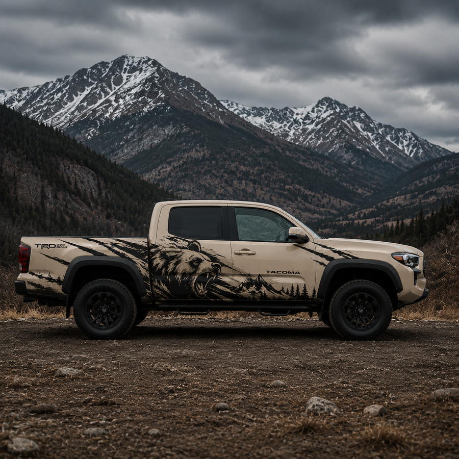Full side view of Toyota Tacoma featuring mountain bear scene truck decal