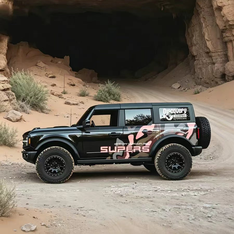 Black SUV with Pink Camo Dreamy Camouflage Overland Side Graphic Vinyl Wrap in Desert
