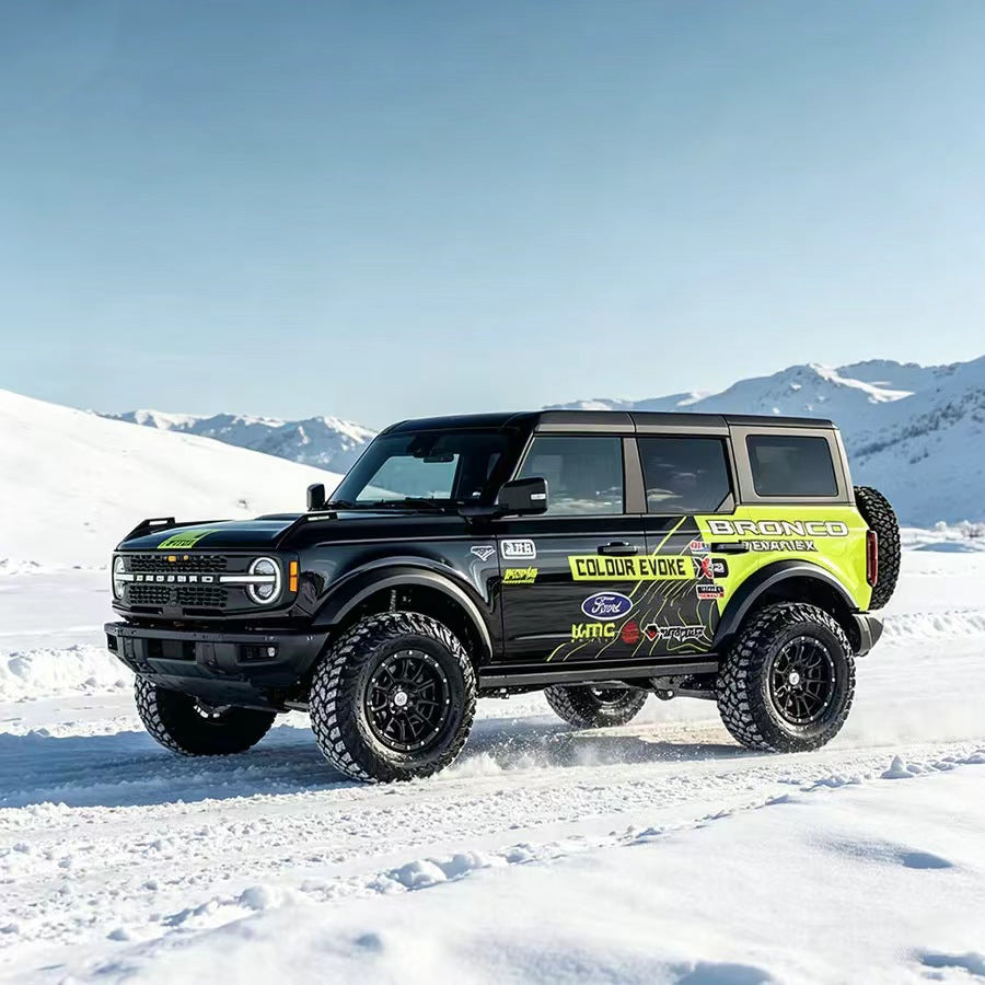 Black Ford Bronco with Neon Green Racing Stripe Performance Side Graphic Vinyl Wrap in Snow