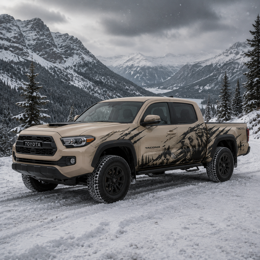 Toyota Tacoma with mountain bear truck decal in dark camo vinyl wrap
