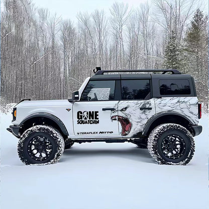 Arctic Wolf SUV Decal Wrap for Jeep Wrangler – Roaring Predator Off-Road Side Graphics on White Bronco in Snowy Forest