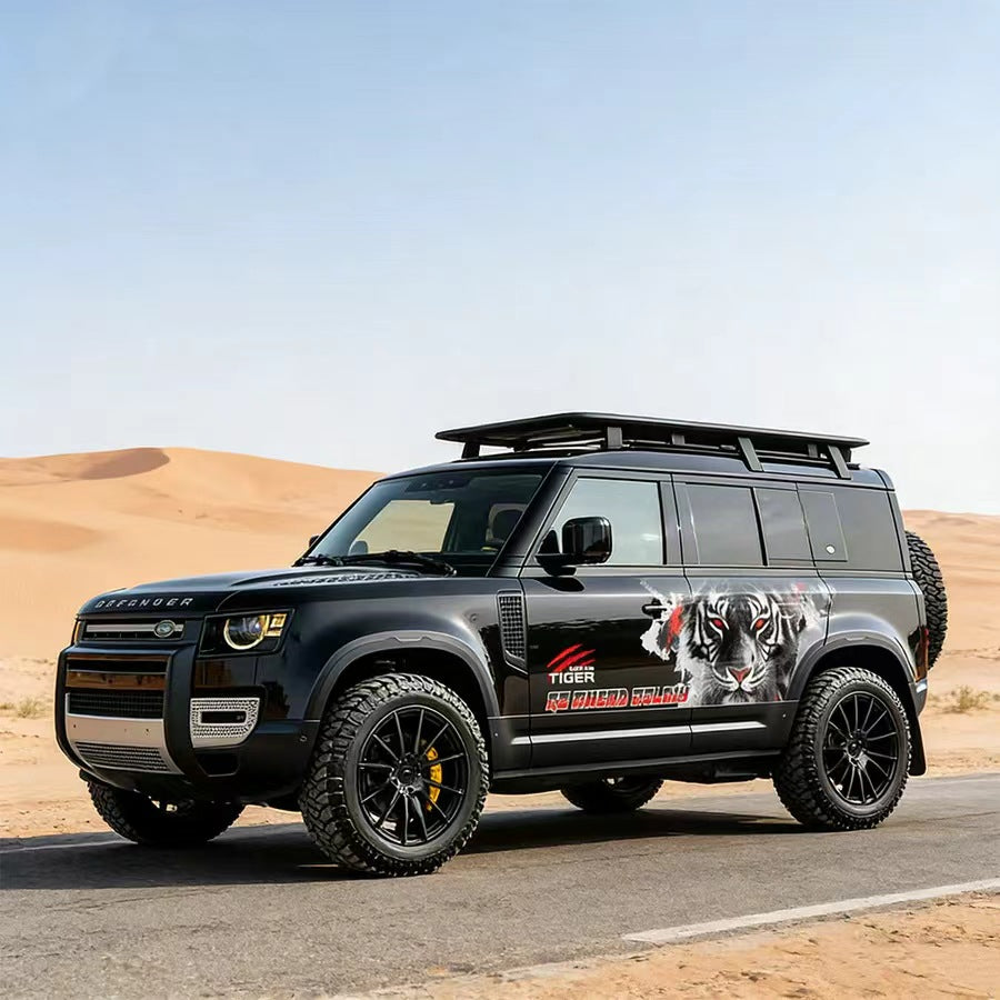 Black SUV with Bold Tiger Front Face Aggressive Side Vinyl Wrap in Desert – Off-Road Decal for Defender Bronco