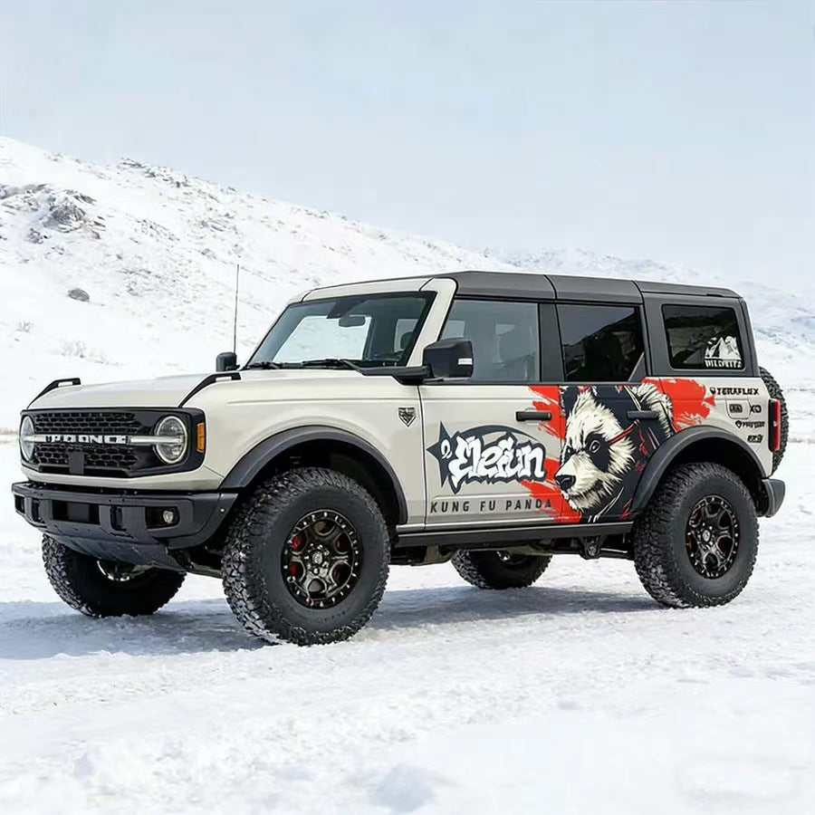Kung Fu Panda side graphic decal on white Bronco SUV – front three-quarter view showing full wrap design