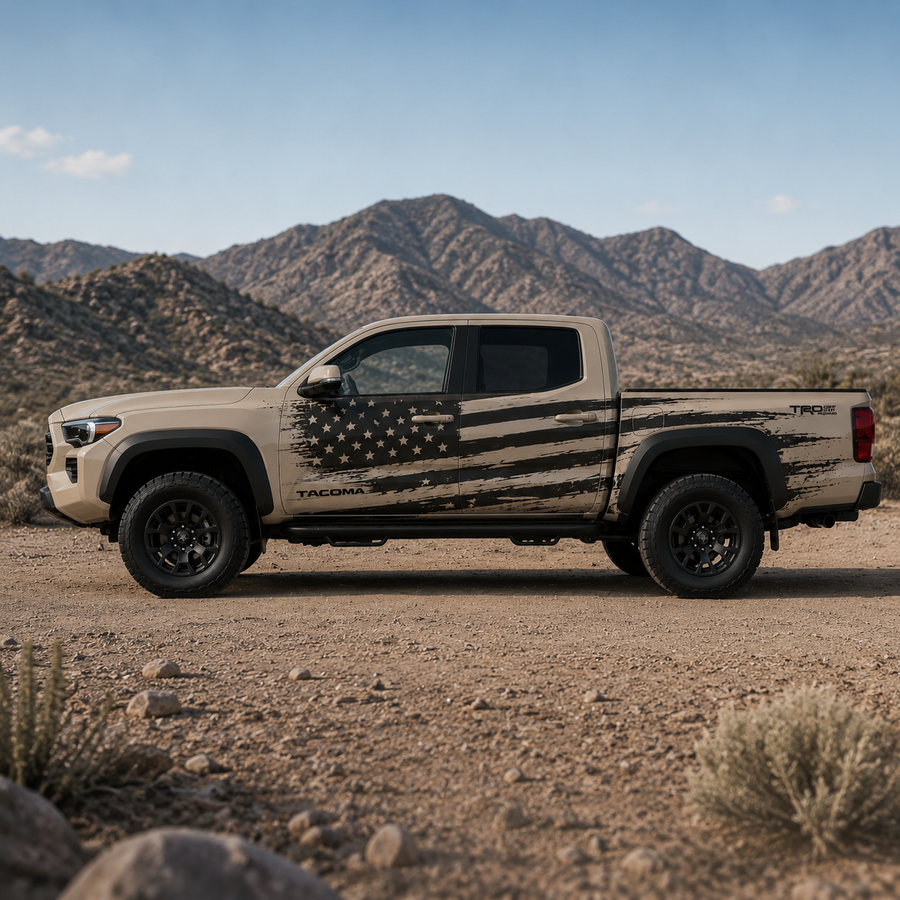 American flag vinyl decal on Toyota Tacoma truck in desert terrain