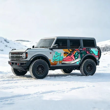 Ford Bronco with Graffiti Side Vinyl Wrap in Snow – Colorful Street Art Car Decal