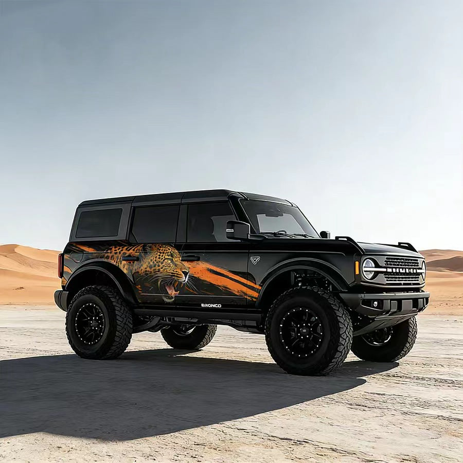 Black Ford Bronco with Leopard Streak Dynamic Animal Side Graphic Vinyl Wrap in Desert