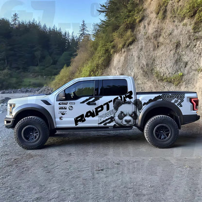 Black and white panda decal applied on pickup truck – outdoor mountain background side view