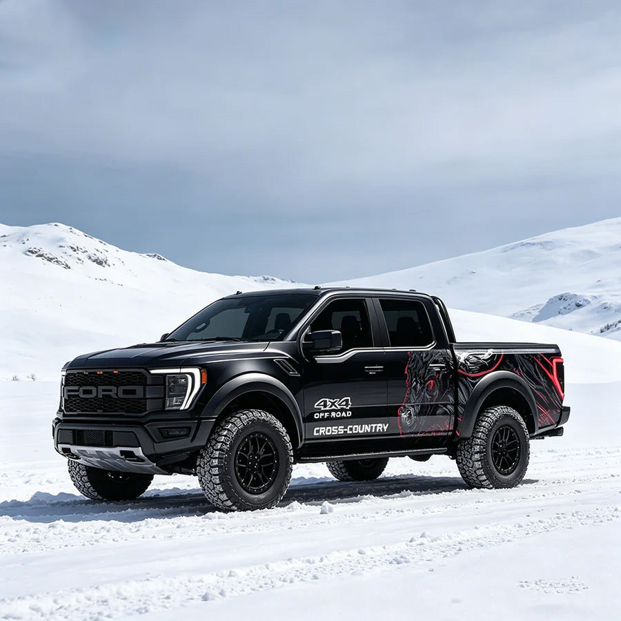 Black bull fury truck decal on Ford Raptor – full side view in snowy outdoor setting
