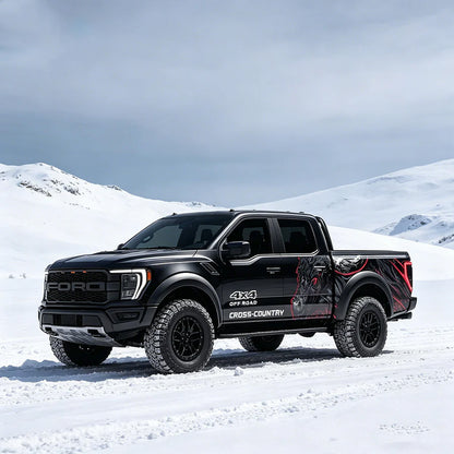 Black bull fury truck decal on Ford Raptor – full side view in snowy outdoor setting