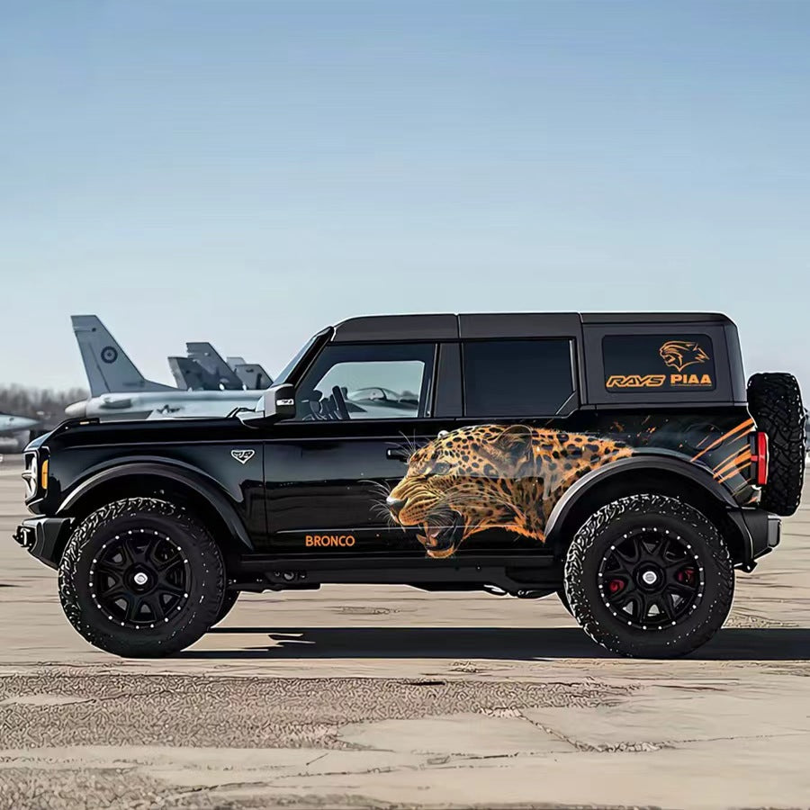 Roaring Leopard SUV Decal – Aggressive Predator Side Graphic Kit on Black Ford Bronco at Airport