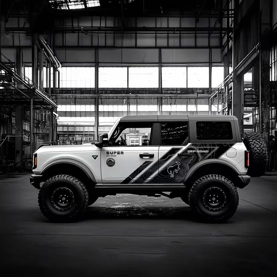 Topographic Stripe Off-Road SUV Decal – Minimal Side Graphic Kit on Black Ford Bronco in Industrial Setting