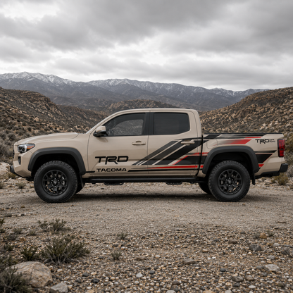 Toyota Tacoma TRD stripe decal kit on truck in snowy mountain setting