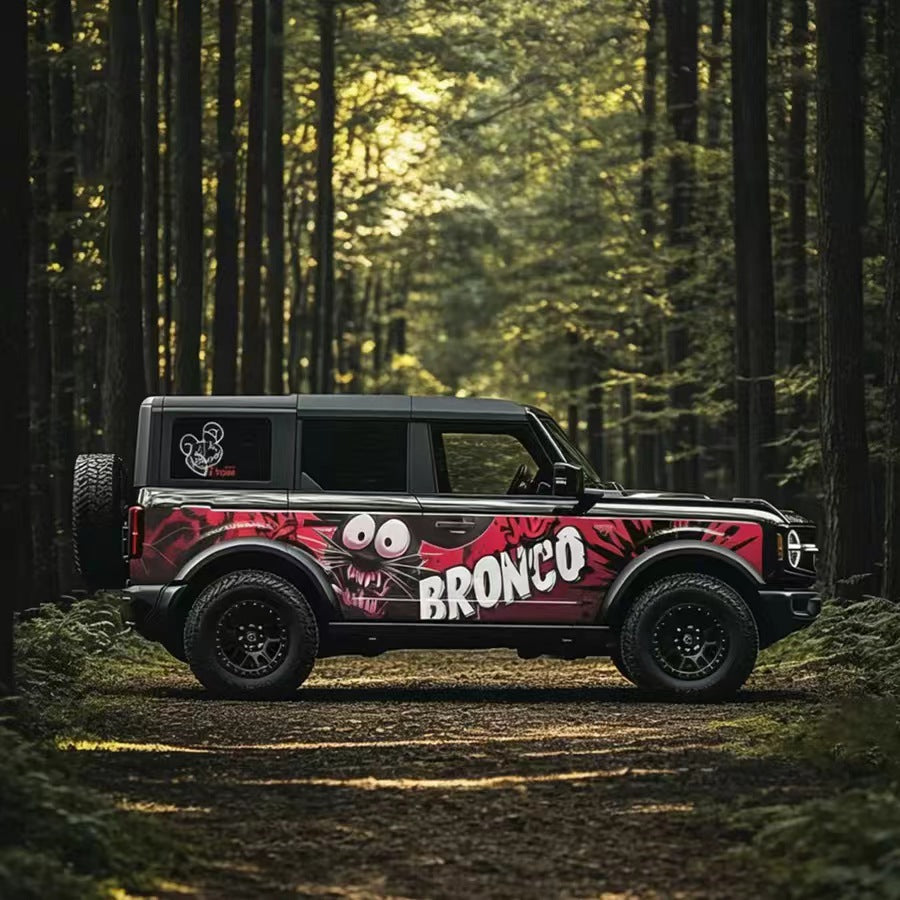 Black Ford Bronco with Graffiti Monster Comic Style Street Art Vinyl Wrap in Forest