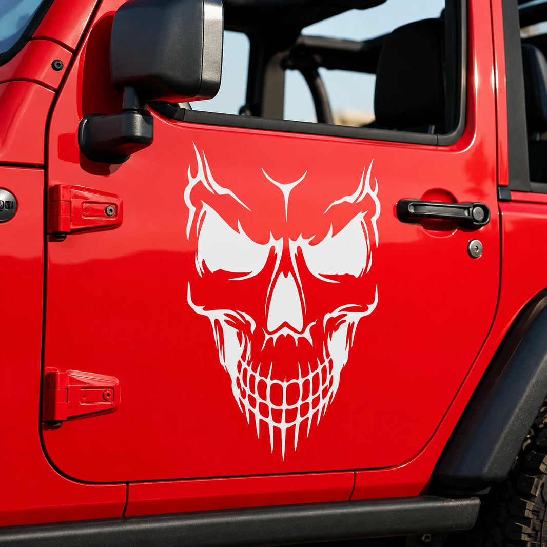 Demon skull full door vinyl decal close-up on red Jeep Wrangler JL 4-door front door panel showing white skull detail