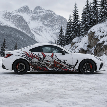 White Toyota GR86 with demon skull flame side decal – full side profile in snowy alpine mountain landscape