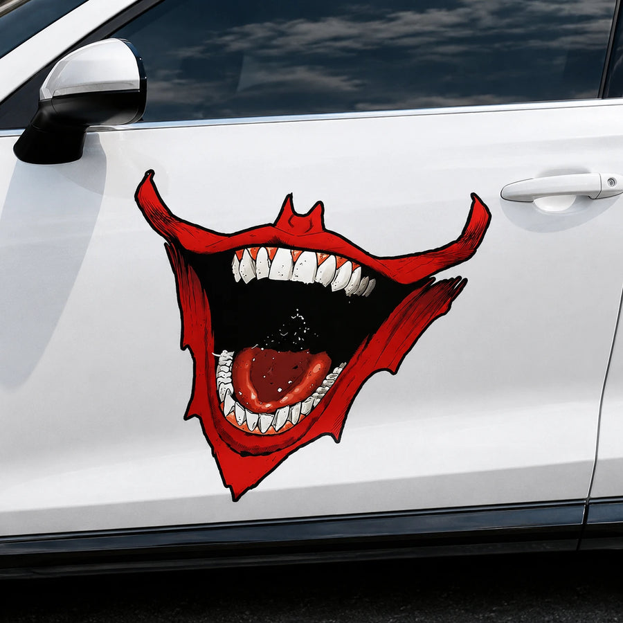 Devil mouth fang vinyl decal close-up on white SUV front door panel showing red demon lips fangs and tongue detail