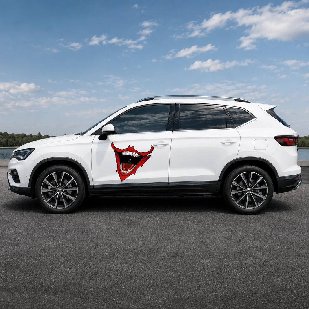 Devil mouth fang vinyl decal installed on white SUV full side view showing demon mouth spanning front door panel