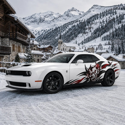 Devil tribal side decal on white Dodge Challenger in snowy mountain village