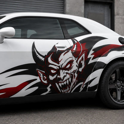 Devil tribal side decal on white sports car close up view