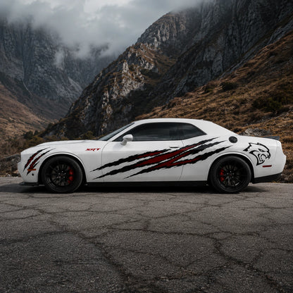 Dodge Challenger SRT Hellcat claw decal front three-quarter view in winter snow
