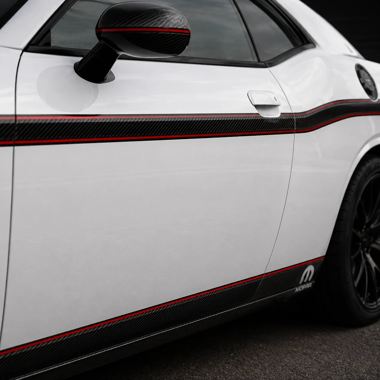 Dodge Challenger R/T 392 HEMI carbon fiber stripe close-up door panel red pinstripe MOPAR badge