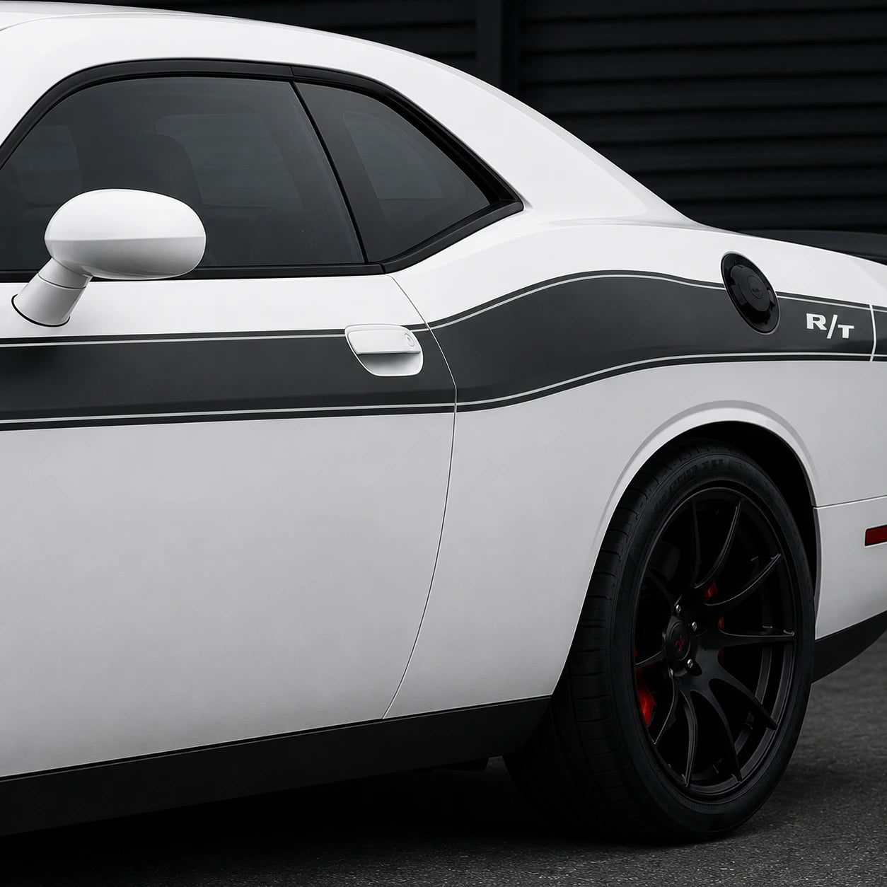 Dodge Challenger R/T classic black side stripe decal close-up rear door quarter panel R/T badge white pinstripe detail