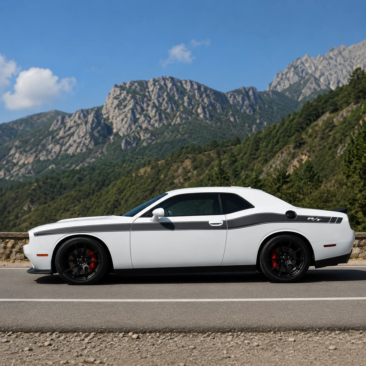 Dodge Challenger R/T classic black side stripe decal full side profile mountain road sunny day blue sky