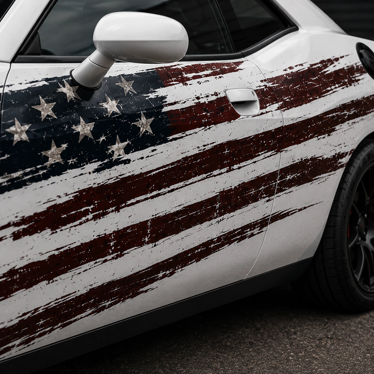 Dodge Challenger R/T distressed American flag decal close-up front door stars and red stripes weathered texture detail