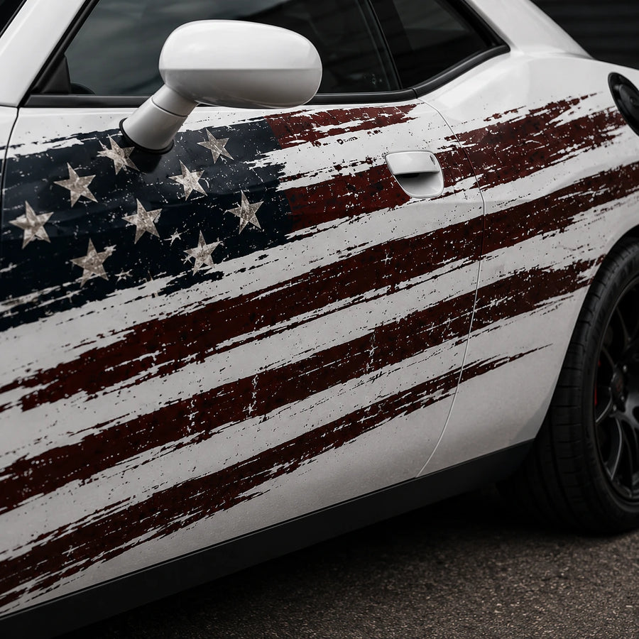 Dodge Challenger R/T distressed American flag decal close-up front door stars and red stripes weathered texture detail