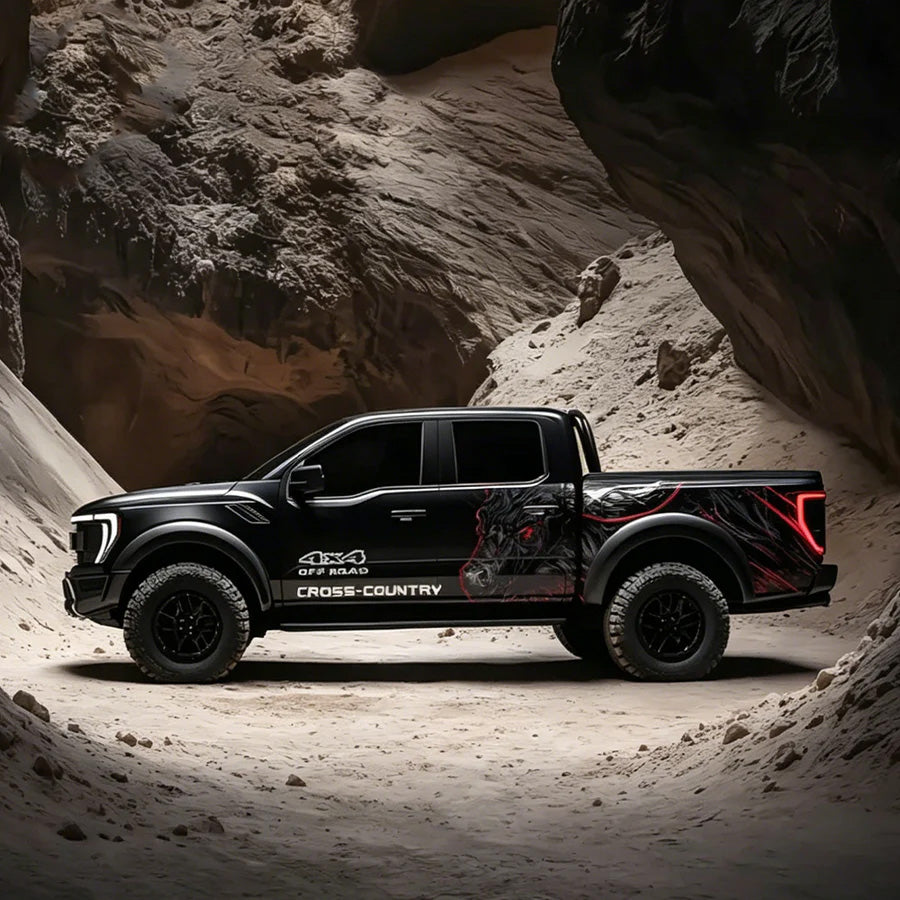 Black bull fury vinyl wrap on black Ford F-150 Raptor – aggressive 4x4 off-road side graphic decal, canyon rock background