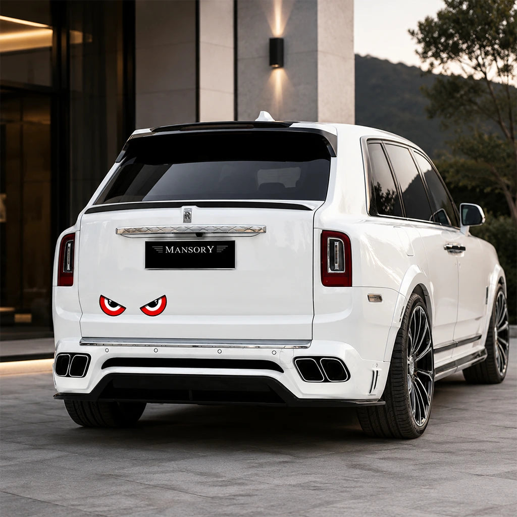 Evil red eyes vinyl car decal on white Rolls-Royce Cullinan rear bumper – scary demon eyes SUV sticker