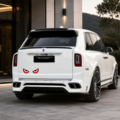 Evil red eyes vinyl car decal on white Rolls-Royce Cullinan rear bumper – scary demon eyes SUV sticker