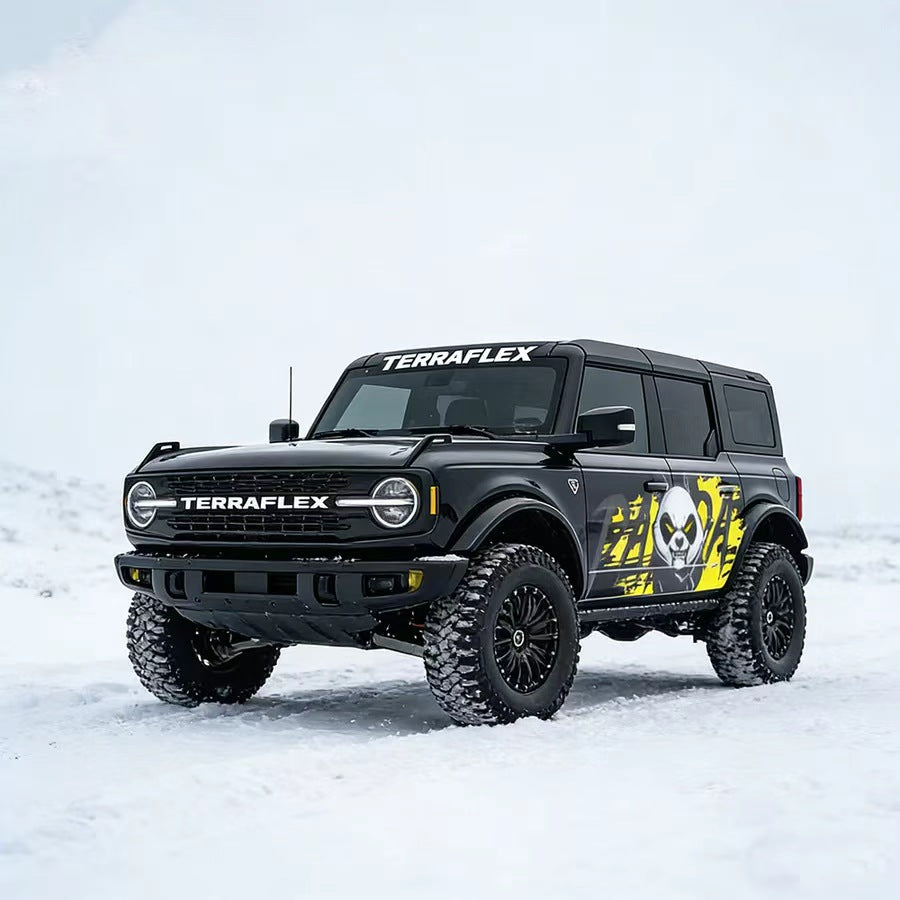 Aggressive panda SUV decal on black Wrangler – front three-quarter studio view showing full yellow street graphic