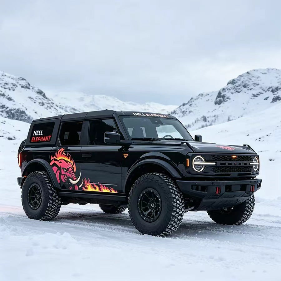 Black SUV with Flaming Elephant Fire Beast Side Graphic Vinyl Wrap in Snow