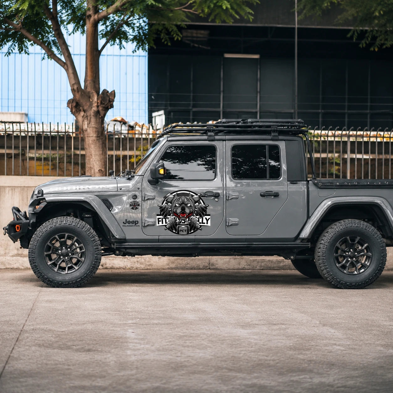 Fitness Bully PCT vinyl decal sticker on Jeep Gladiator full side view street

