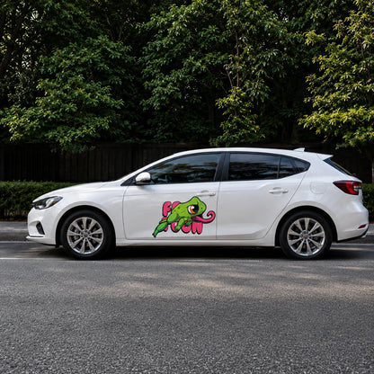 Frog Toon funny vinyl decal on white hatchback full side view street trees background
