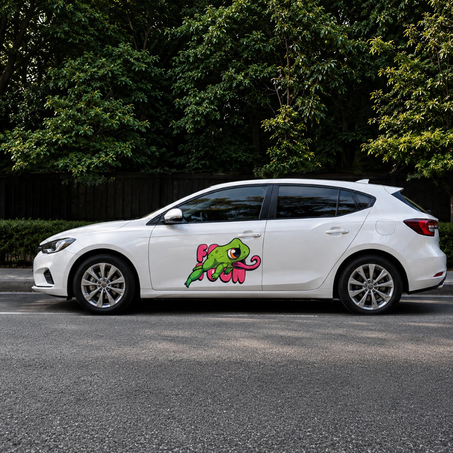 Frog Toon funny vinyl decal on white hatchback full side view street trees background