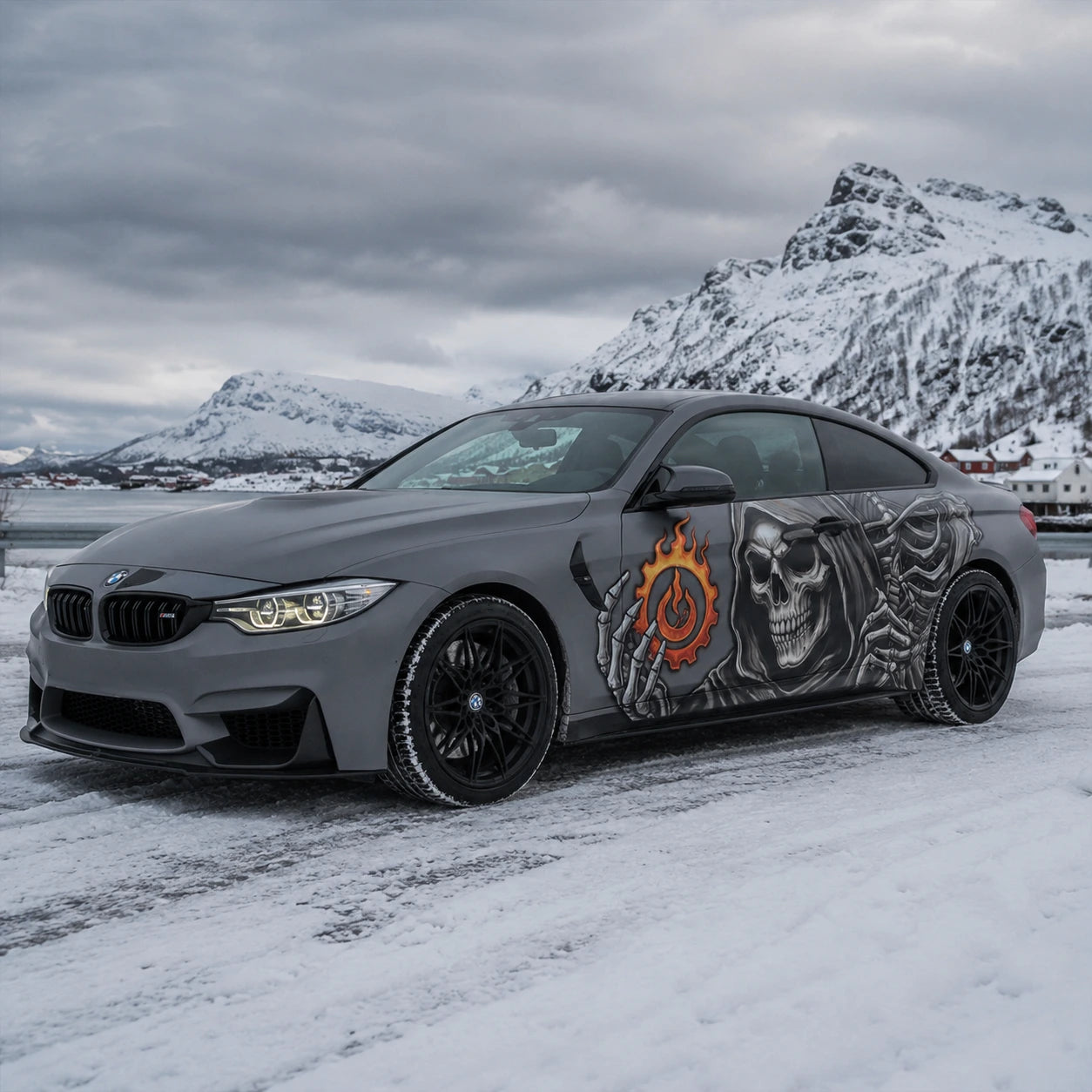 Grim reaper skull vinyl car side decal on matte gray BMW M4 – front 3/4 view in snowy Norwegian fjord setting