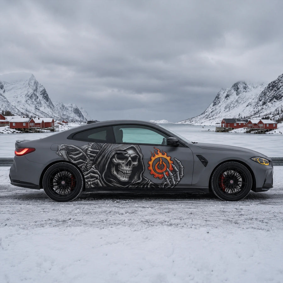 Matte gray BMW M4 with grim reaper skull side decal – full side profile in snowy Norwegian village landscape