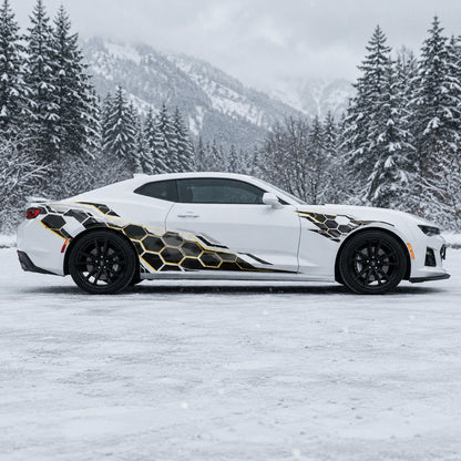 White Chevrolet Camaro ZL1 with honeycomb racing side decal – full side profile in snowy alpine forest setting