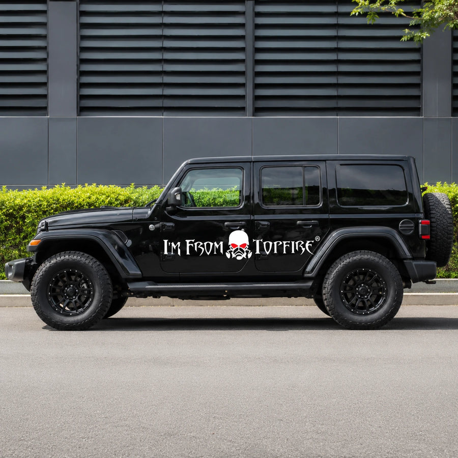 I'm From Topfire vinyl banner decal full side view on black Jeep Wrangler Unlimited parked on street