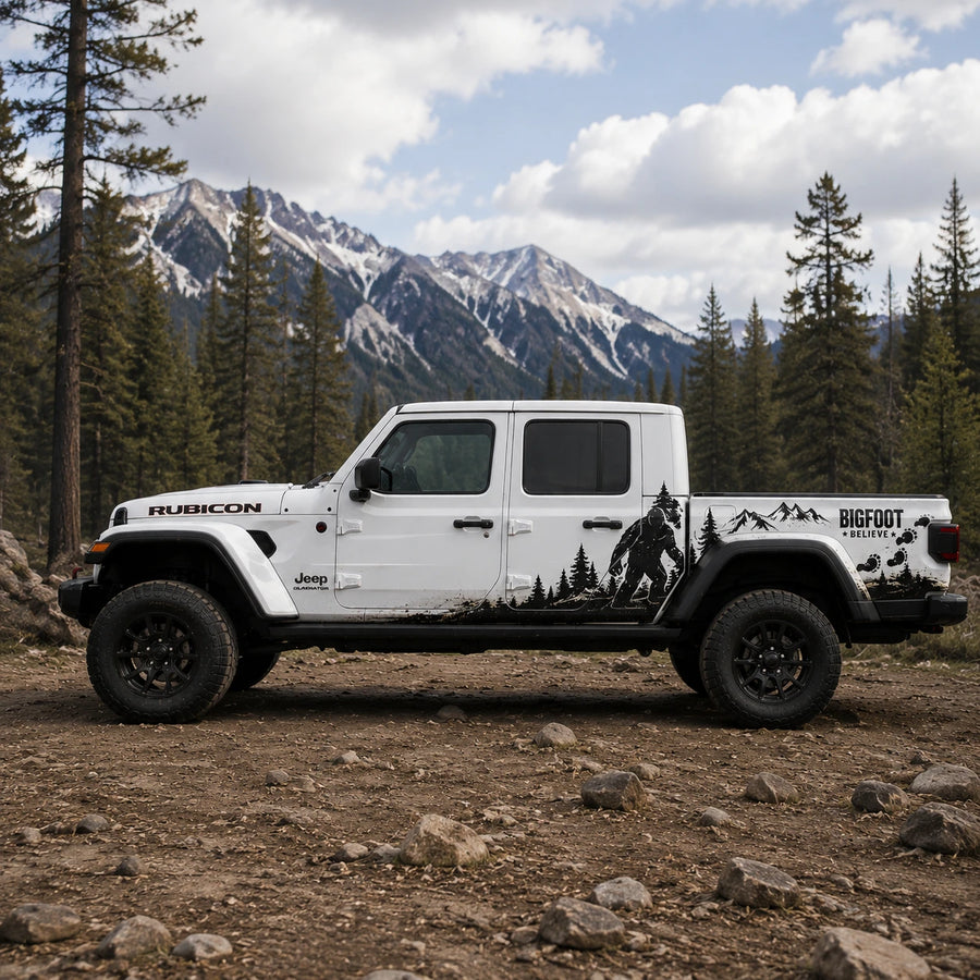 Jeep Gladiator Bigfoot decal – driver side view in rocky mountain terrain