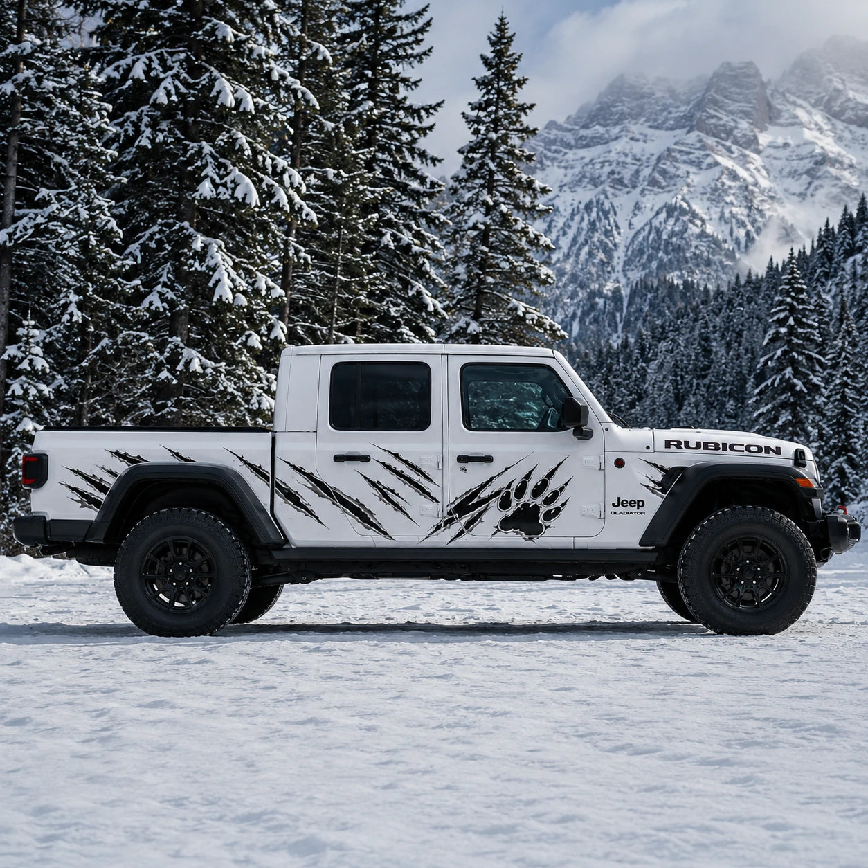 Jeep Gladiator Rubicon bear claw scratch decal kit – full driver side view in snowy pine forest mountain setting