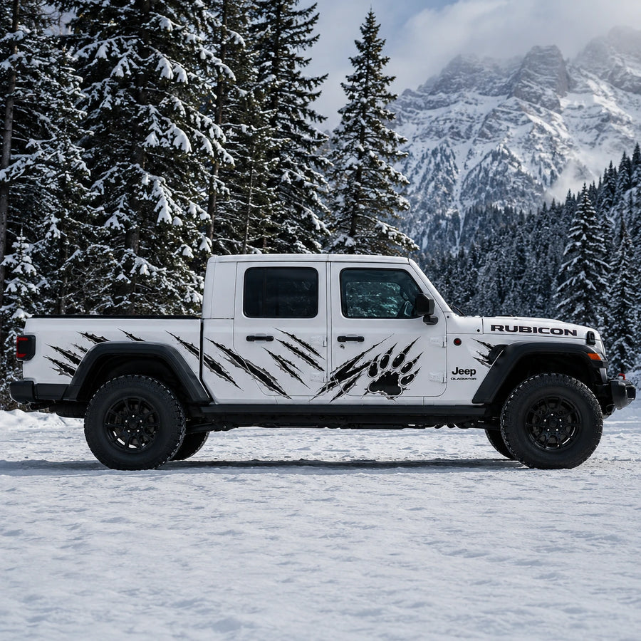 Jeep Gladiator Rubicon bear claw scratch decal kit – full driver side view in snowy pine forest mountain setting
