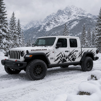 Jeep Gladiator Rubicon bear claw scratch decal – front 3/4 view in snowy alpine mountain setting